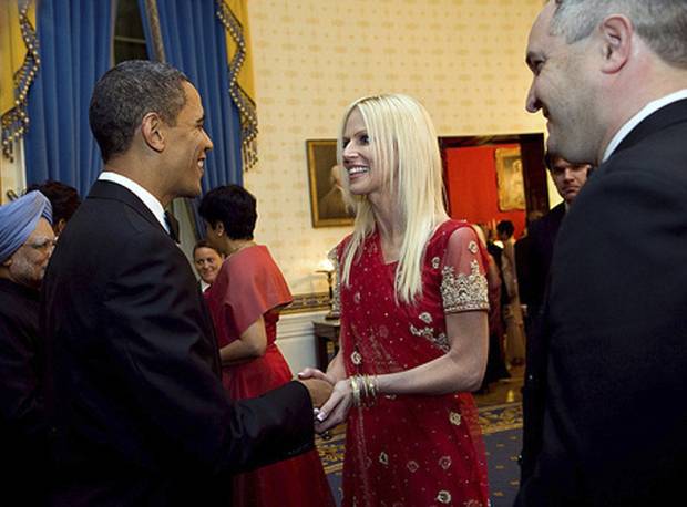 U.S. President Barack Obama greets Michaele Salahi and her husband Tareq during a state dinner for India's Prime Minister Manmohan Singh, left, at the White House on Nov. 24, 2009. The Salahis penetrated layers of security to enter the White House without an invitation.