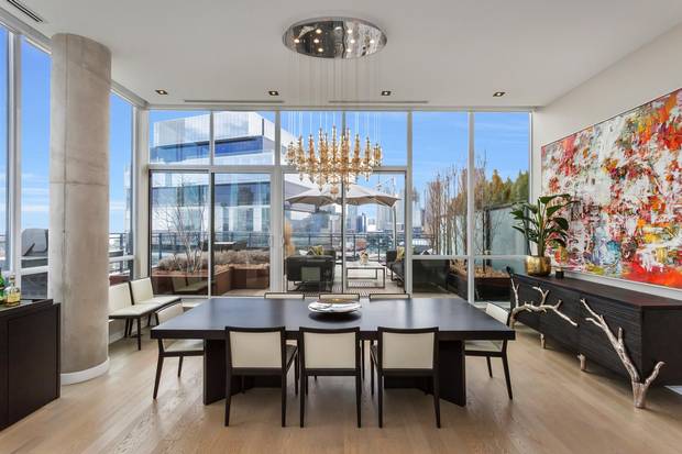 The dining room of penthouse 2 at 318 King St. E.