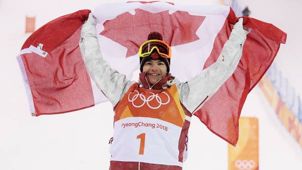 Gold medalist Mikael Kingsbury of Canada celebrates winning the freestyle skiing men's moguls final at the 2018 Winter Olympic Games