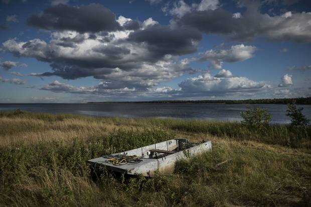 A dilapidated scow, once used for fishing, sits in a field in Kouchibouguac National Park near the site where Jackie Vautour and his wife, Yvonne, were arrested for illegally fishing shellfish.