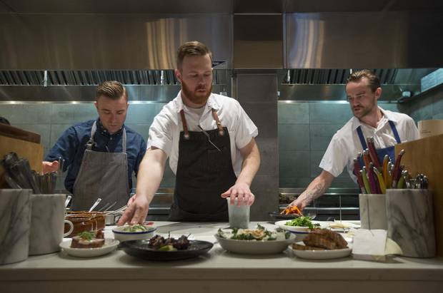 Stephen Smee, executive chef/owner; Andrew Moore, chef de cuisine; and Neil Maclean work the line at Ten Foot Henry.