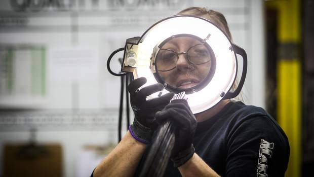 Liz Samms inspects brake lines destined for the U.S. made by Caledon Tubing, a division of Martinrea International, in St. Marys, Ont. on Monday December 5, 2016.