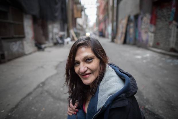 Melody Cooper, 41, poses for a photograph in the Downtown Eastside in Vancouver. Ms. Cooper, who has been using drugs since she was 27, is now receiving hydromorphone and says it has changed her life.