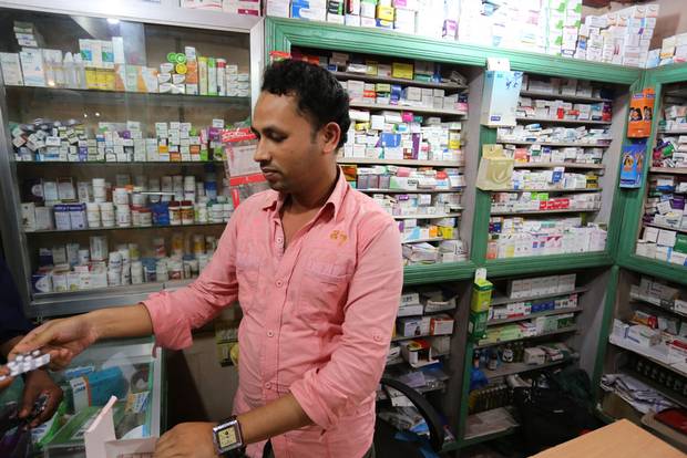 Pharmacist Abul Hamid discovered the human trafficking around his small shop when a young man raced in, bleeding from wounds and begged for help.
