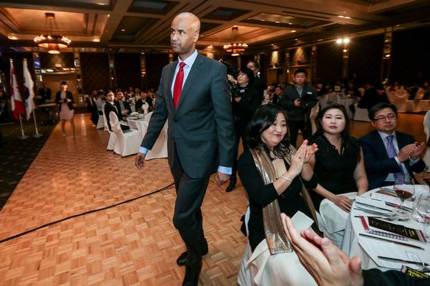Mr. Hussen walks to the podium to speak at the gala.