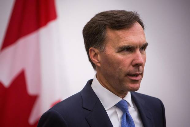 Finance Minister Bill Morneau speaks to media during a press conference in Vancouver on Sept. 5, 2017.