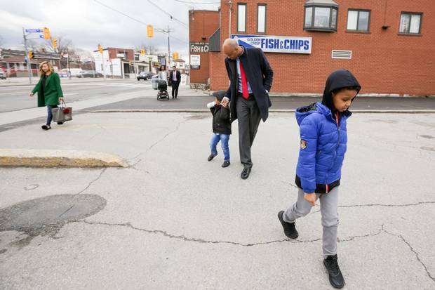 Mr. Hussen sets out for his riding tour with his wife Ebyan, at the rear with a stroller, and his three children: Mayhab, 7, right, Maahir, 3, and five-month-old Saalim.