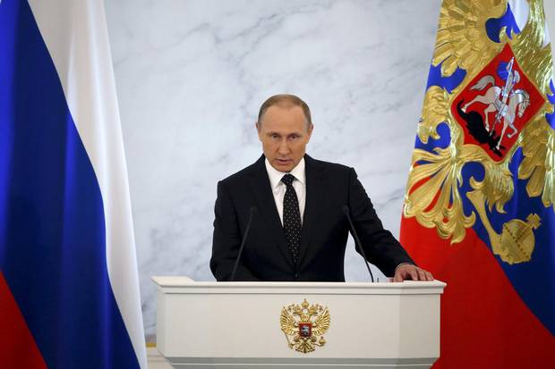 Russian President Vladimir Putin addresses the Federal Assembly at the Kremlin in Moscow on Dec. 3, 2015.