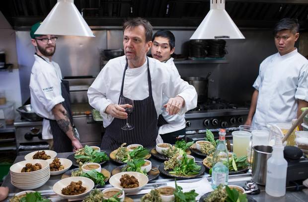 Chef David Thompson, visiting from his Michelin-starred Nahm Restaurant in Bangkok, cooks at Maenam on Saturday.