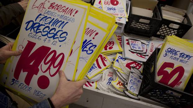 A large crowd of people waited in line, inside and out, to have a chance to purchase some of the many hand-made signs at Honest Ed's in Toronto on March 10, 2014. Even an hour after the doors opened the line still stretched around the entire block which Ed's sits upon.