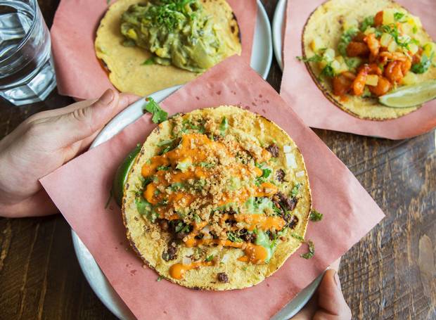 The Campechano, rajas con crema and camarones tacos are seen during lunch at Campechano in Toronto on April 13, 2016.