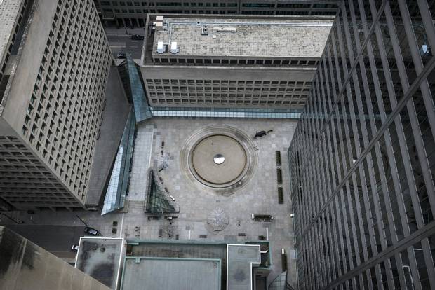The courtyard of Toronto's Commerce Court in its current state (above) and reimagined by Hariri Pontarini Architects (below).