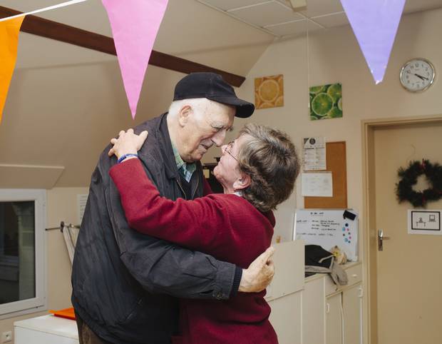 Jean Vanier visits the residents in one of the L’Arche homes.