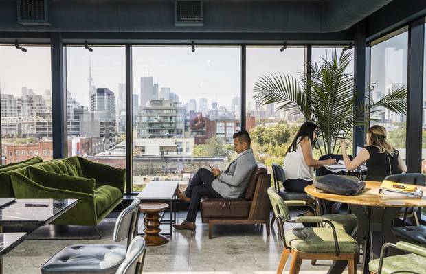 Jason Chapman sits in the Broadview Hotel's rooftop lounge.