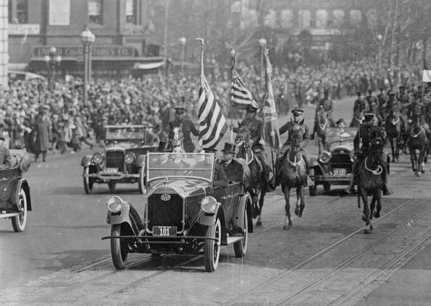 President Calvin Coolidge rides in a car during his inaugural parade in Washington, D.C., U.S. in March 1925. 