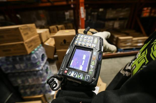 Flanagan’s e-commerce market also helps differentiate the company from its competition, according to Odegi‘s Mr. Mr. Reyes. Here, pickers use scanners to help track down the correct product for the correct restaurant inside Flanagan’s warehouse distribution centre in Kitchener, Ont.