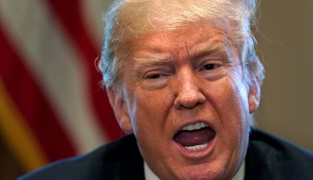 U.S. President Donald Trump announces that the United States will impose tariffs of 25 per cent on steel imports and 10 per cent on imported aluminum during a meeting at the White House in Washington, U.S., March 1, 2018.