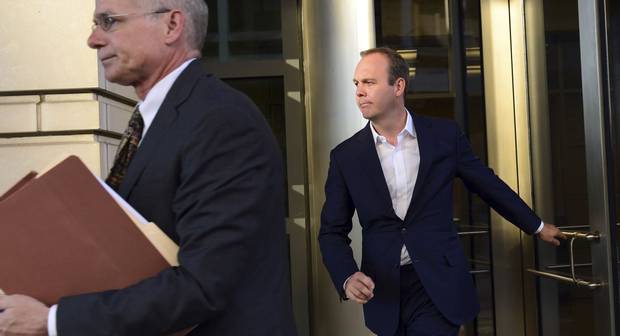 Oct. 30, 2017: Rick Gates, right, leaves federal court in Washington.