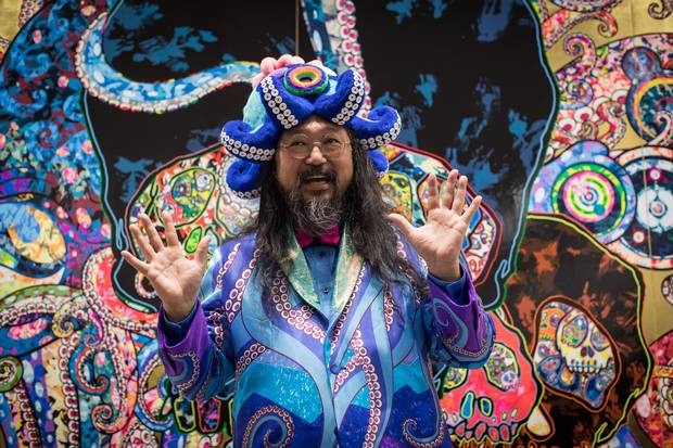 Japanese artist Takashi Murakami poses for photographs during a preview of his 'The Octopus Eats Its Own Leg' exhibition at the Vancouver Art Gallery on Feb. 1, 2018.