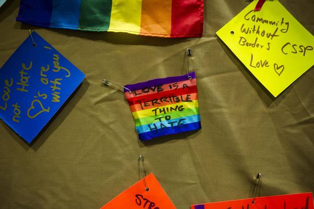 Notes of support are displayed in the 519 community centre in Toronto on Feb. 13. The centre co-hosted a vigil in honour of the victims in the Bruce McArthur case.