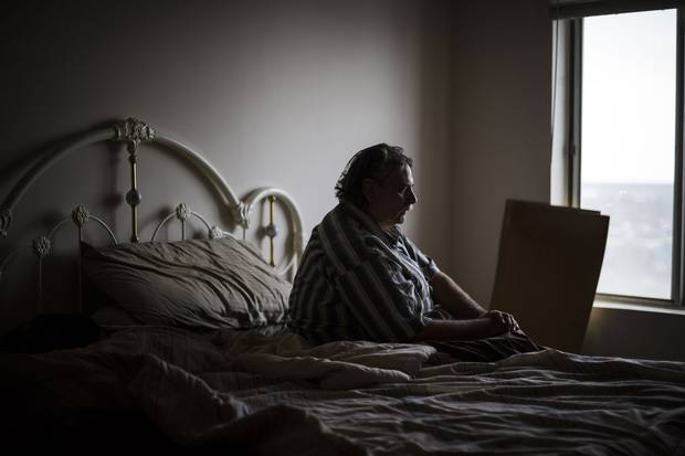 Edward Tanner, shown in his home in Sarnia, Ont., lost his benefits from insurance company Allstate based on a neurologist's report. Mr. Tanner fought for five years to have Allstate pay for treatment of his brain injury, and during that time, he says, he got addicted to prescription opioids and also began selling them to pay his bills. Read more about his case below.