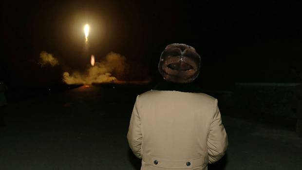 An undated picture released from North Korea’s official news agency shows North Korean leader Kim Jong-un attending a mobile drill for ballistic rocket launches at an undisclosed location in 2016.