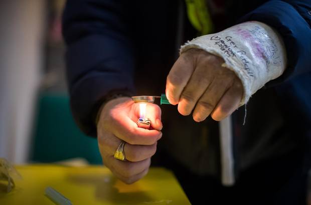 Steve Creeman, 62, prepares Heroin at VANDU’s overdose prevention site.