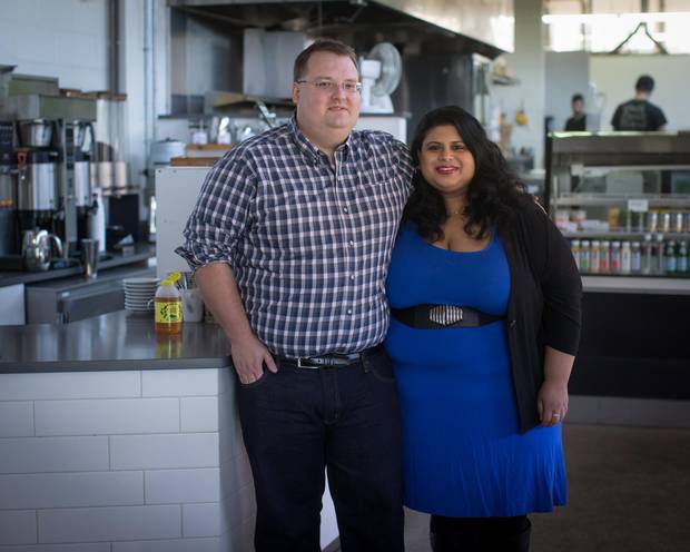 Jeff Salzsauler and Michelle Pinto are shown at an outlet of Vancouver’s JJ Bean Coffee Roasters, where Mr. Salzsauler works as a product developer. 'If we were still living in Winnipeg, we would be an upper-class family,' Mr. Salzsauler says. 'But in Vancouver, we are very solidly middle-class.'