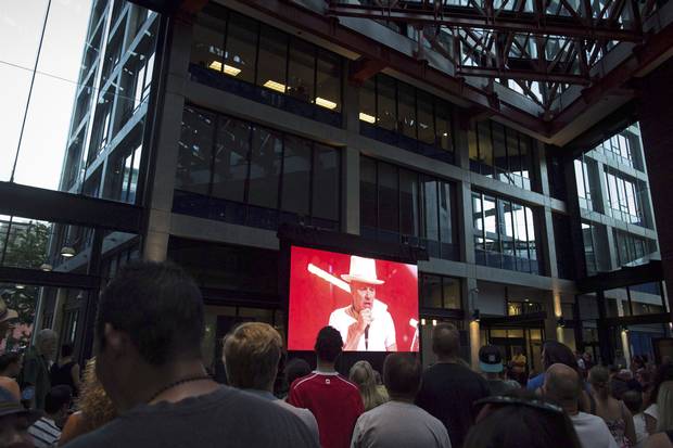 Fans in Vancouver gather at a viewing party for the final Tragically Hip show in Kingston.