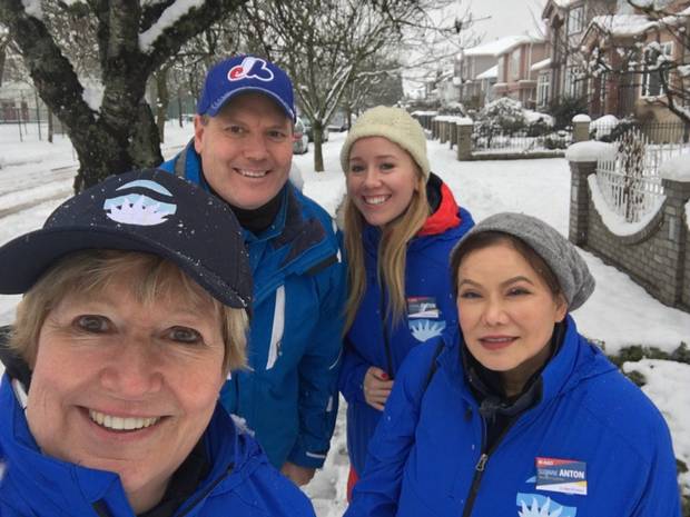 Mark Jiles (back lefT) is seen with B.C. Minister of Justice Suzanne Anton (front left).