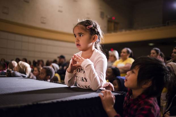 Aleah Razor, 4, takes part in worship. From the vantage point of most Christian churches in Canada, whose parishioners skew much older, every day at C3 is Kids Takeover day.