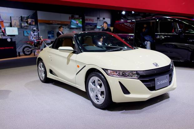 The Honda S660 at the Tokyo Auto Show. The introduction of kei jidosha, or little cars, in the 1950s, got many Japanese people off motorcycles and into cars.