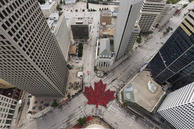 2017: Winnipeggers form a ‘living leaf’ of 4,000 people at Portage and Main on July 1, marking 150 years of Canadian Confederation.