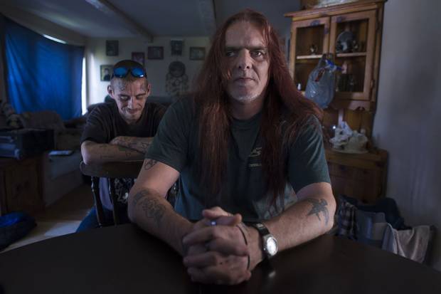 Byron Ruttan, right, and his son Bryon live in a small rented home in Verona, Ont., near Kingston. Both men are dealing with the anger and lasting trauma of the abuse suffered by the elder Mr. Ruttan as a child.