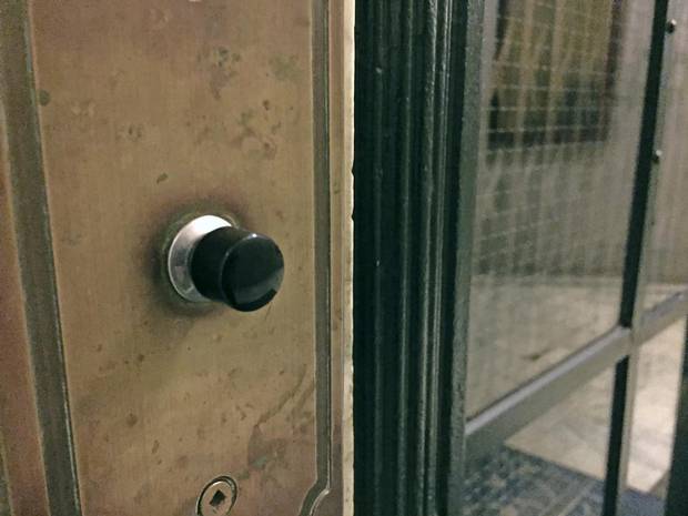 The call bell on a manually controlled elevator built in 1908 at 10 Adelaide Street East in Toronto.