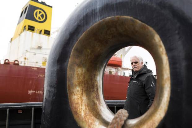 Vice-president of the B.C. Coast Pilots, Robin Stewart, poses for a photo while on escort of the Eser K oil tanker.