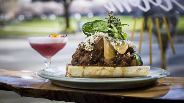 Bone,Tongue & Harmony (bone marrow with braised beef tongue, beets and horseradish) the Lady Wallflower cocktail are pictured at The Mackenzie Room in Vancouver, British Columbia on March 16, 2016. (BEN NELMS for The Globe and Mail)