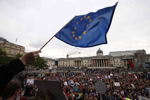 People gather for an anti-Brexit protest in Trafalgar Square in central London.