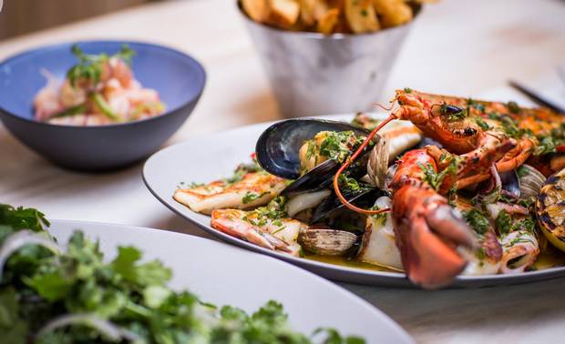 The seafood hot mess with chermoula fries at Vancouver's Oddfish Restaurant.