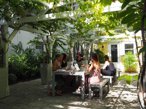 Liza is the blond at the front of the communal table and Ester is across from her.
