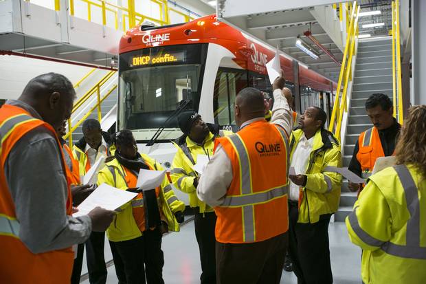 M-1 Rail workers gather for a morning meeting at the Penske Tech Center.