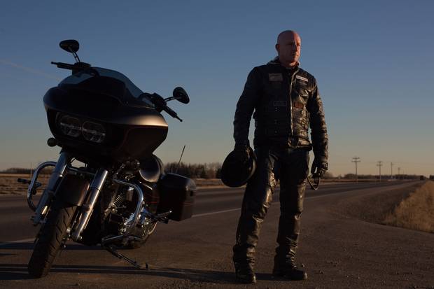 Retired Corporal Russ Lee was has been on the edge of suicide many times, but has found a way forward, through church, therapy, long motorcycle rides, and work as an Alberta Sheriff.