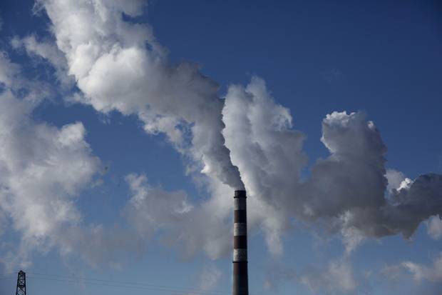 Smoke billows from a coal-fired power plant on Nov. 25, 2015, in Shanxi, China.