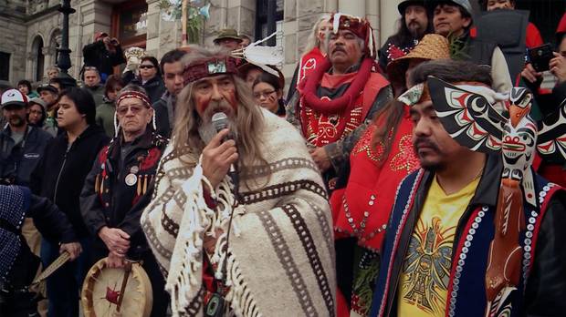 Beau Dick speaks to the crowd during the journey from Alert Bay to Victoria, where Dick and his cohort performed an ancient copper breaking ceremony on the steps of the Canadian legislature as an act of shaming the government for its treatment of First Nations people.