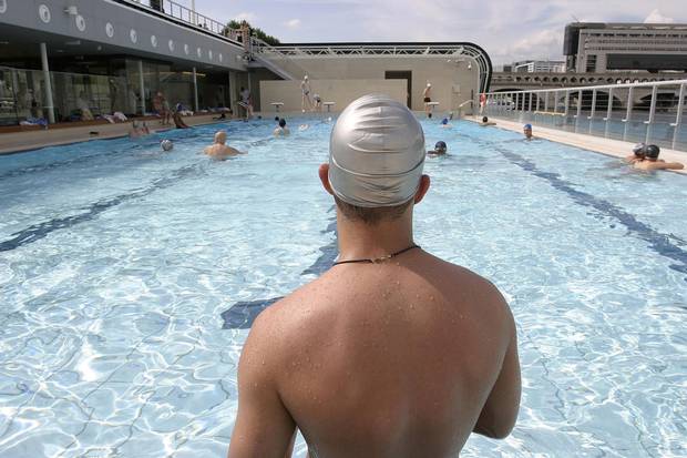 Swimmers at the Josephine Baker swimming pool on July 6, 2006 on the Seine in Paris, France.