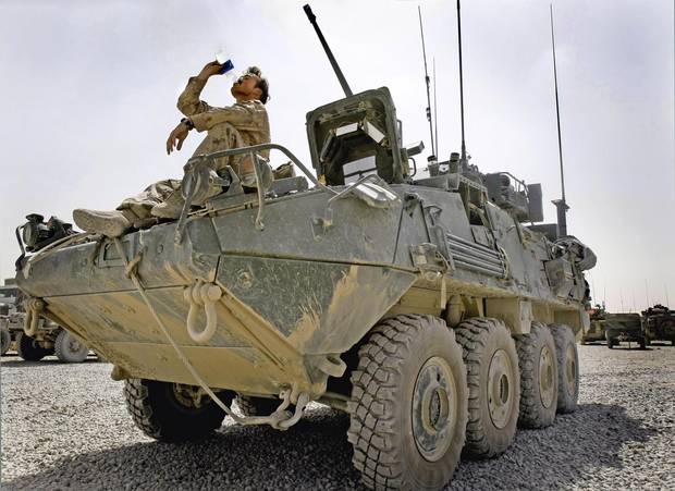 Canadian soldier Steve Sabo with the 2nd Battalion, Princess Patricia's Canadian Light Infantry from Shilo, Manitoba, drinks some water on a LAV-3 on Friday Aug. 1, 2008.