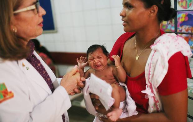 A pediatric infectologist at Oswaldo Cruz Hospital in Recife, Brazil speaks to Ivalda Caetano, grandmother of two-month-old Ludmilla, who has microcephaly. In the past four months, Brazil has recorded more than 4,000 cases in which the mosquito-borne Zika virus may have led to microcephaly in infants.
