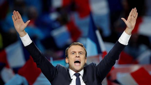 Emmanuel Macron attends a campaign political rally in Paris on April 17, 2017.