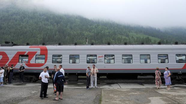 The Baikal-Amur Mainline railroad, en route to Moscow from Tynda, stops in Khani, Russia, July 4, 2012.