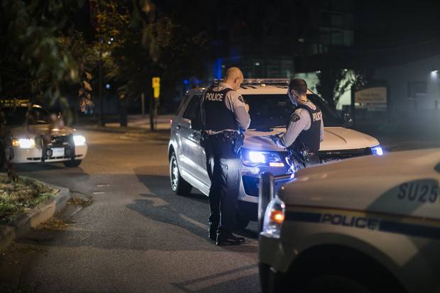 Surrey, 2017: RCMP constables attend a call in the Whalley neighbourhood.